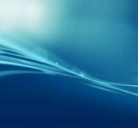Abstract blue background with smooth light waves.